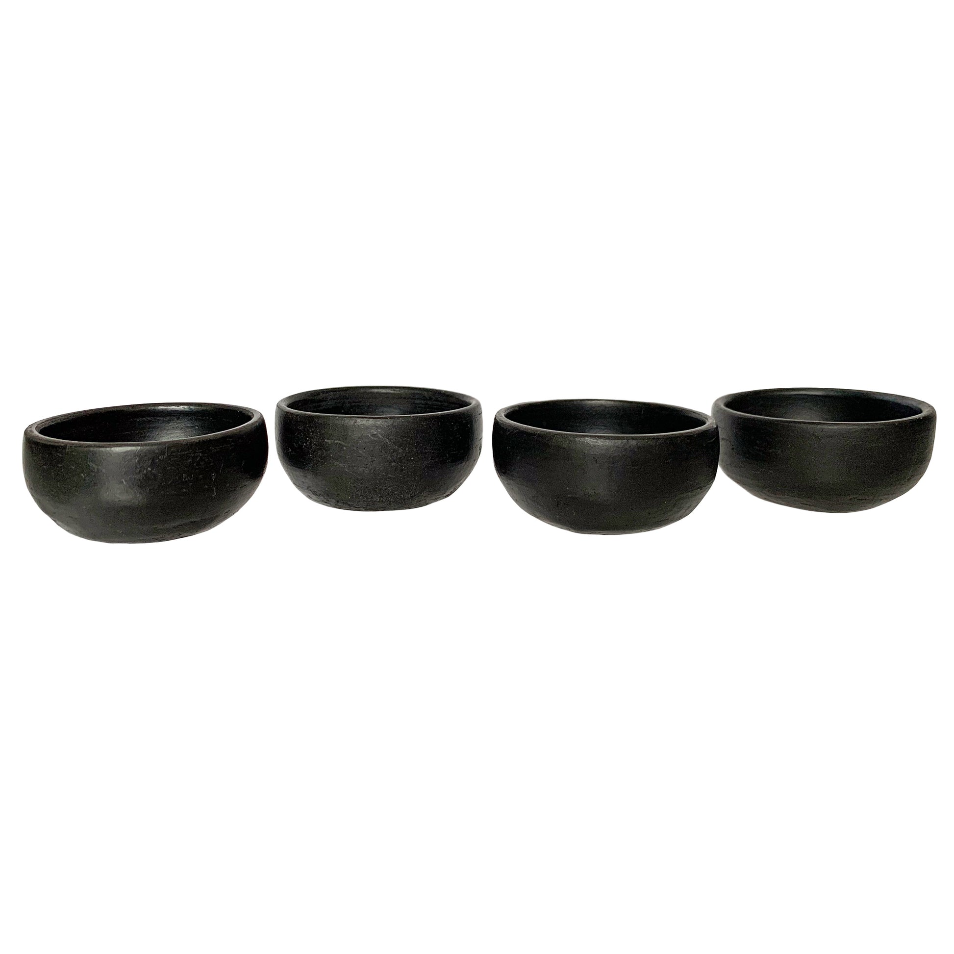 https://www.thecuratedpantry.com/cdn/shop/products/black-clay-wide-copitas3.jpg?v=1637117265&width=1946